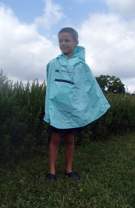 Kid Wearing Roo Rain Gear Waterproog Poncho on a hike in New Jersey