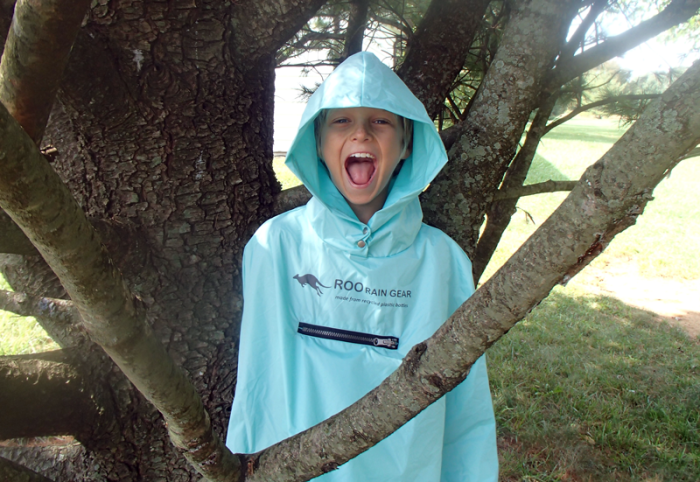 Kid wearing Roo Rain Gear Waterproof poncho on a hike in New Jersey
